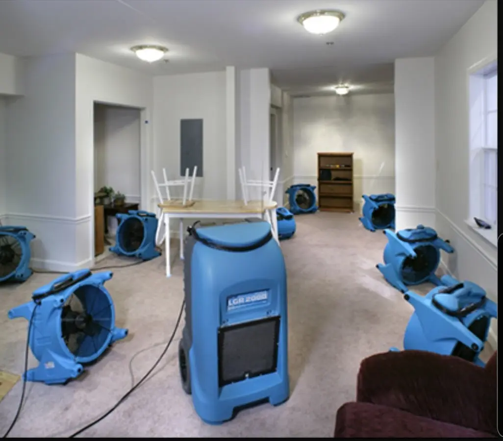Air movers and dehumidifier setup for Water Damage Restoration in Southbury